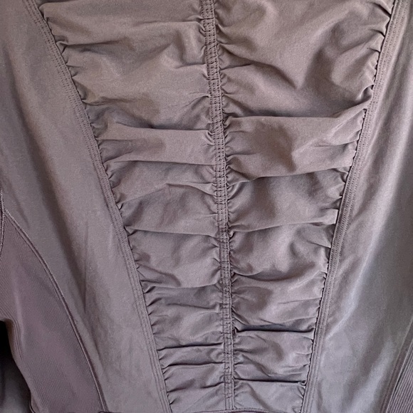 Lulu lemon zip up jacket. Size 12. Plum colored in excellent condition. - Picture 6 of 6